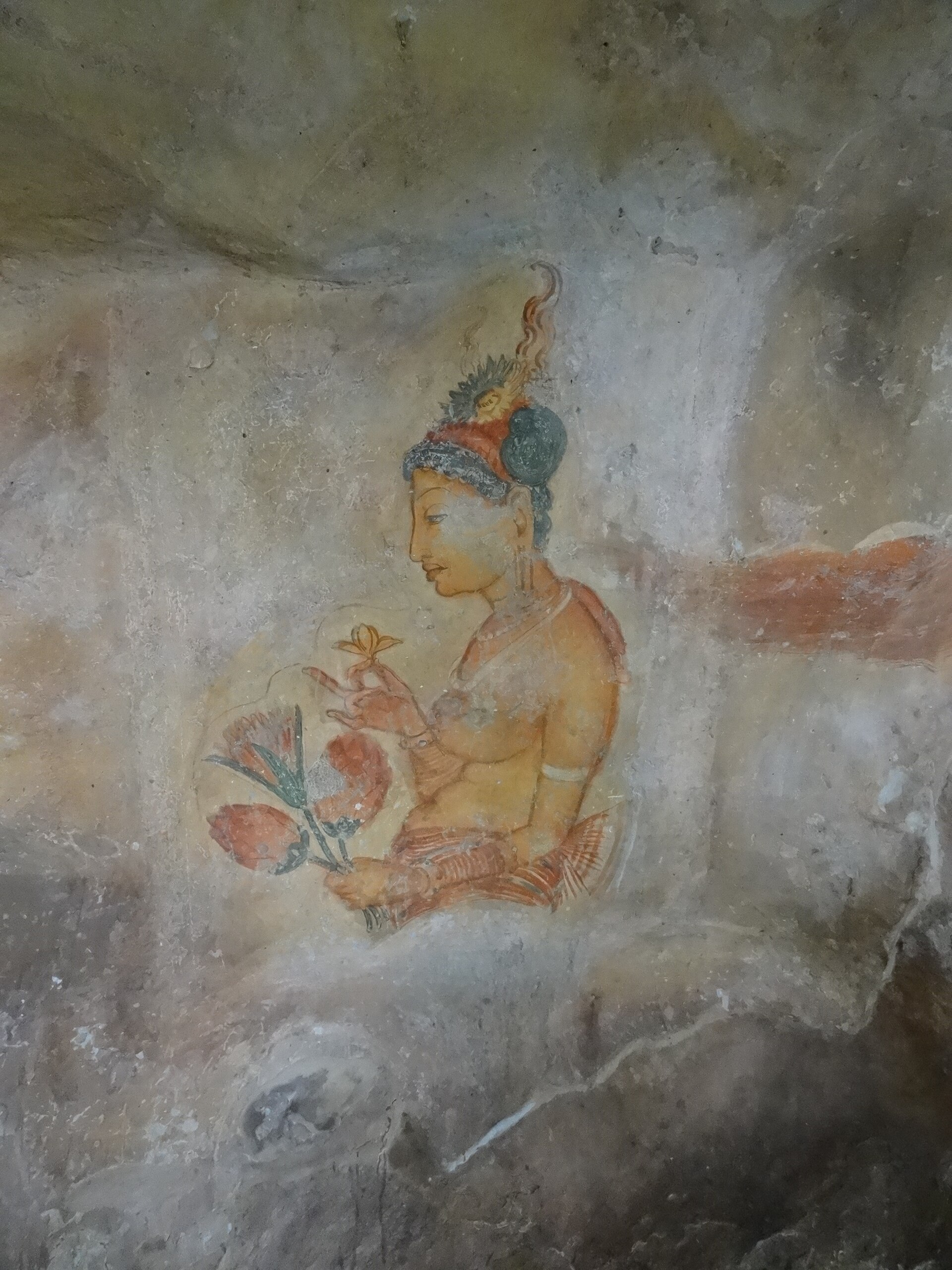 Sigiriya day tour from Colombo - ancient frescoes on the rock face