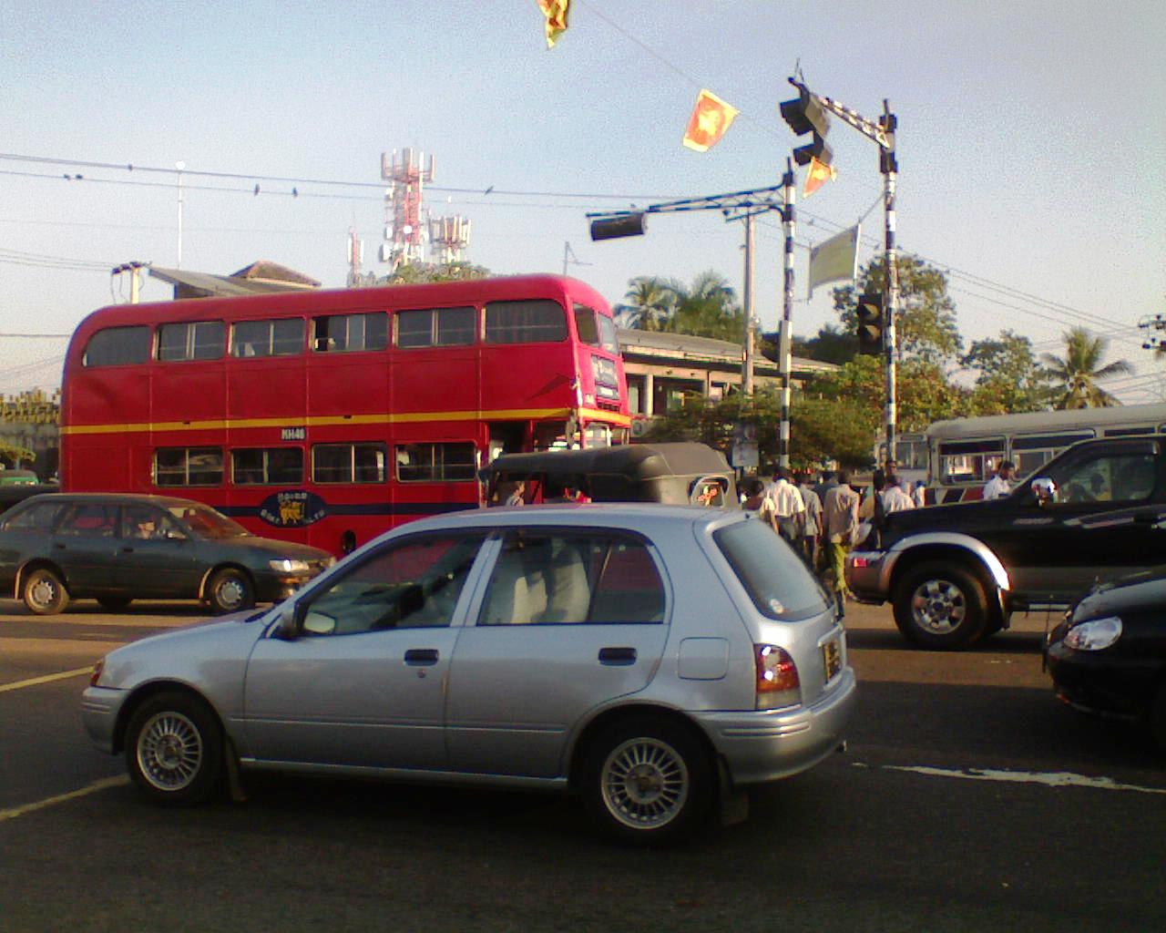 Sri Lanka transport costs - double-decker bus on a Colombo street