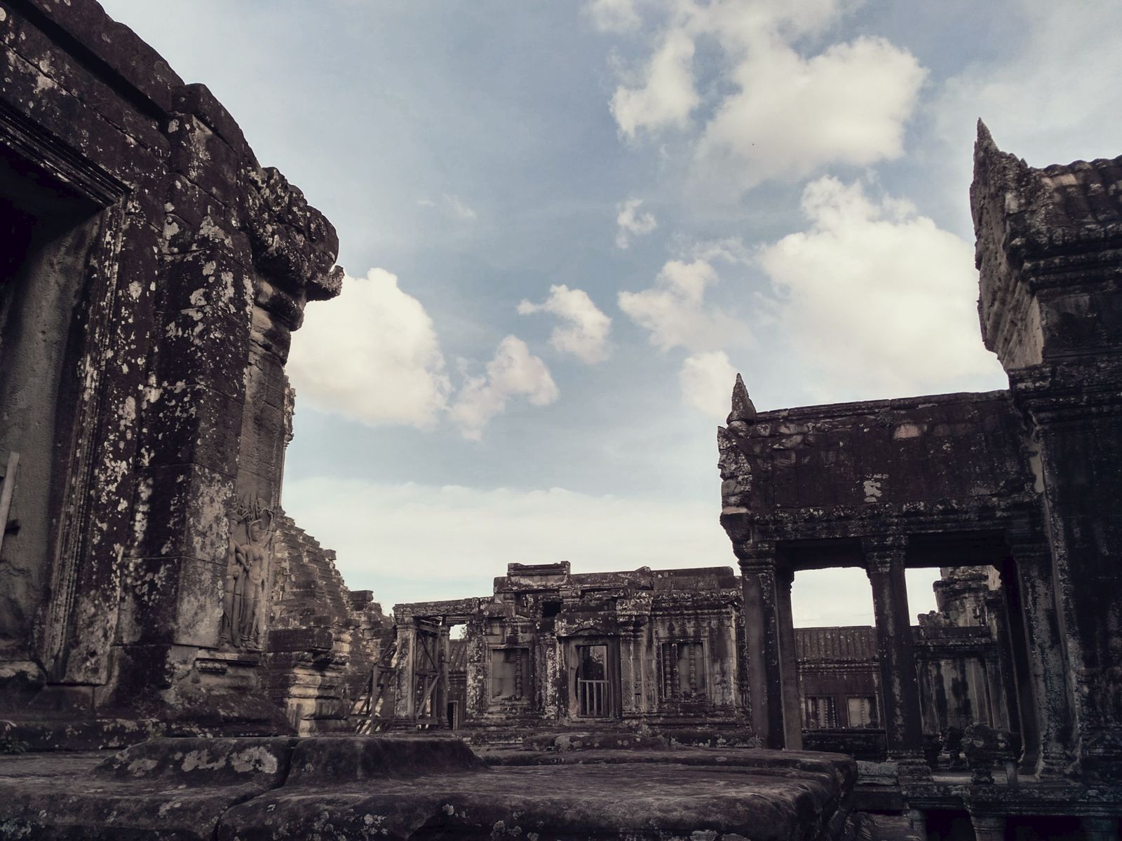 Sri Lanka Cultural Triangle tour - monsoon clouds over weathered stone ruins in the dry zone