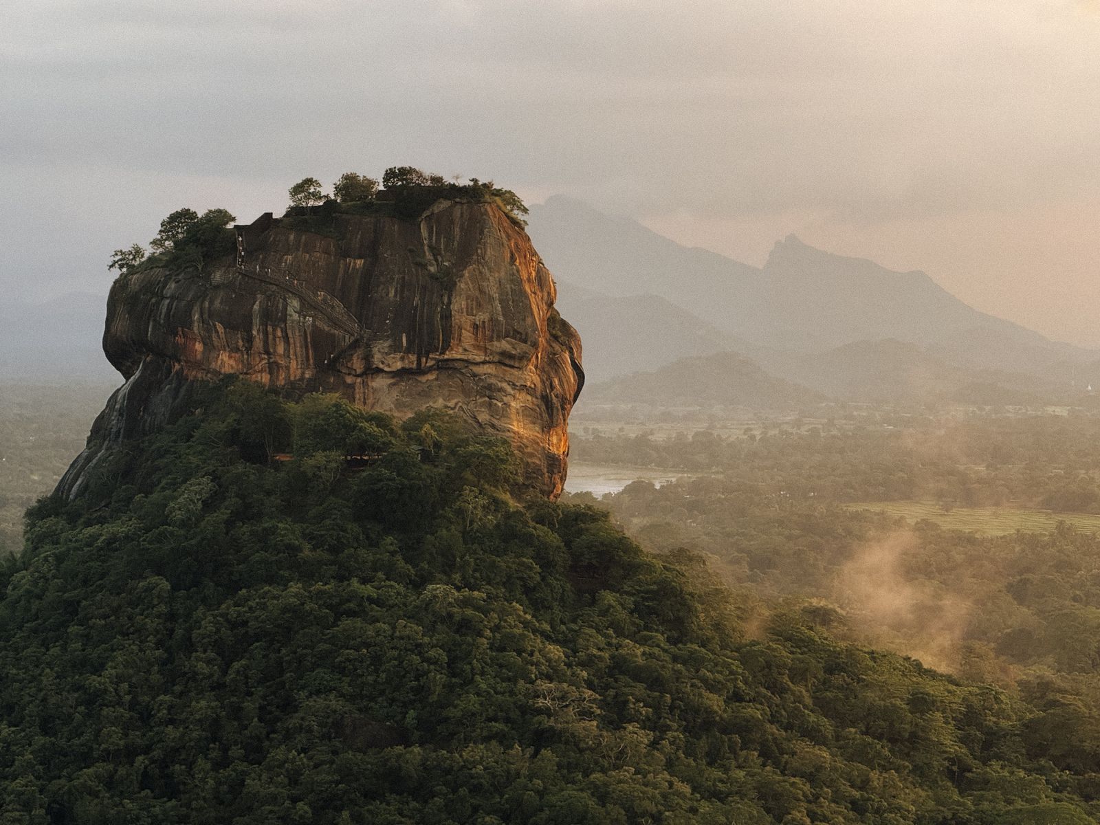 Sri Lanka family tour packages - Sigiriya rock fortress rising above the jungle