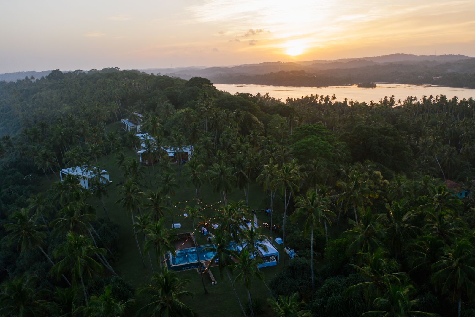 bespoke Sri Lanka holiday packages - tropical resort with pool at sunset